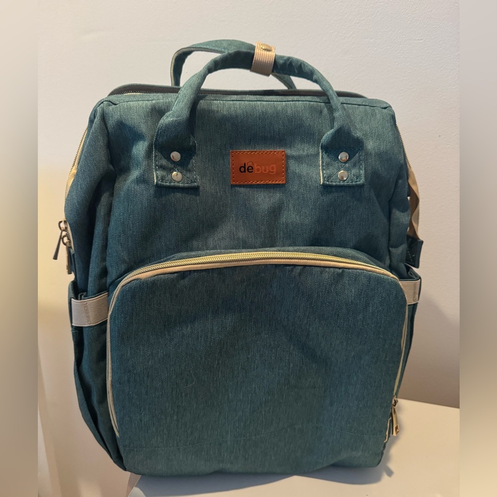 Debug Teal Diaper bag Backpack with changing station built in